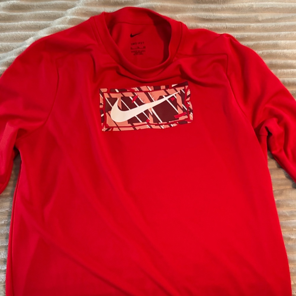 Youth XL Nike Vibrant Red Dri-Fit Crewneck long sleeve shirt.